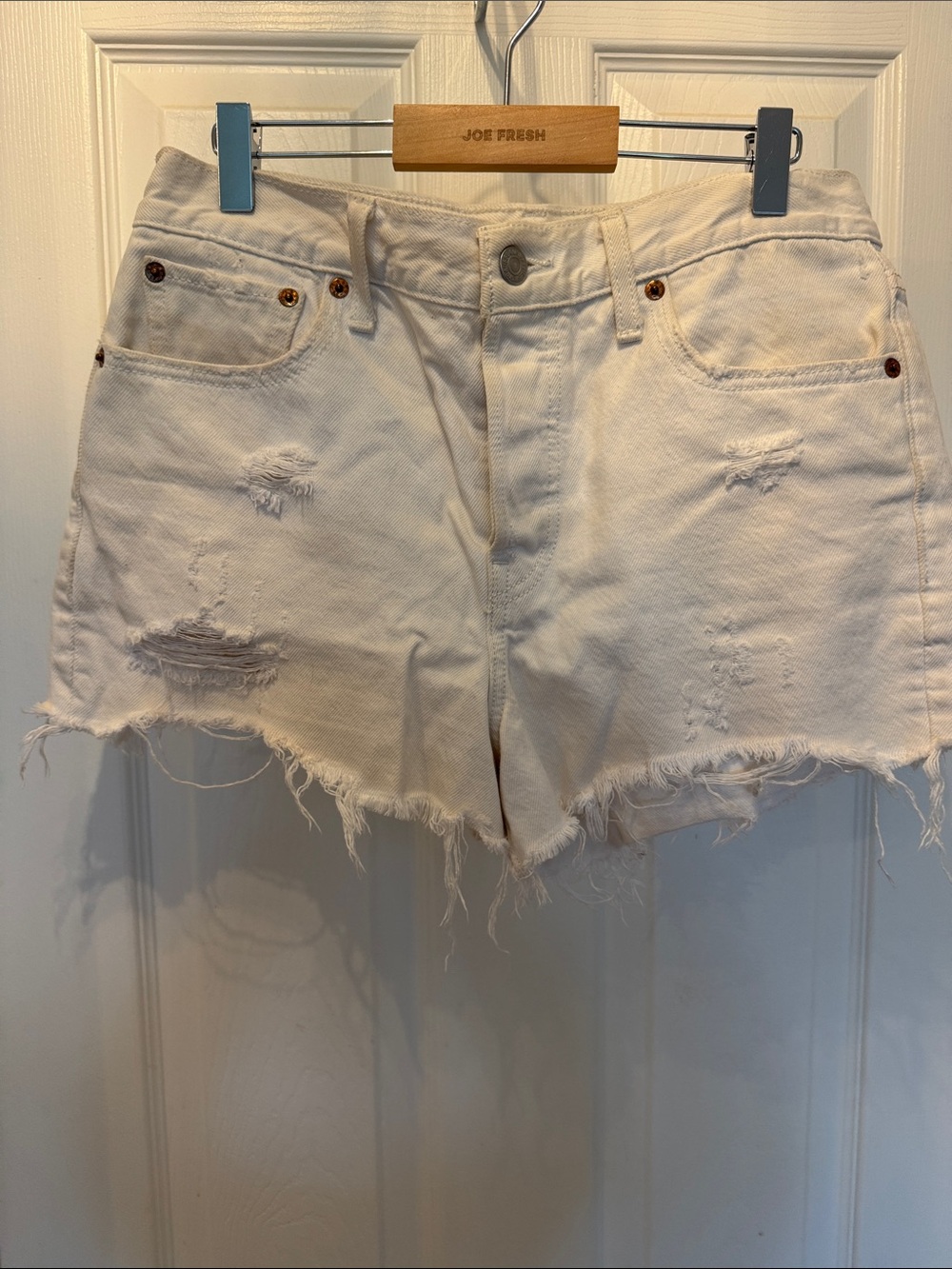 Levi's White Distressed Denim Cutoff Shorts